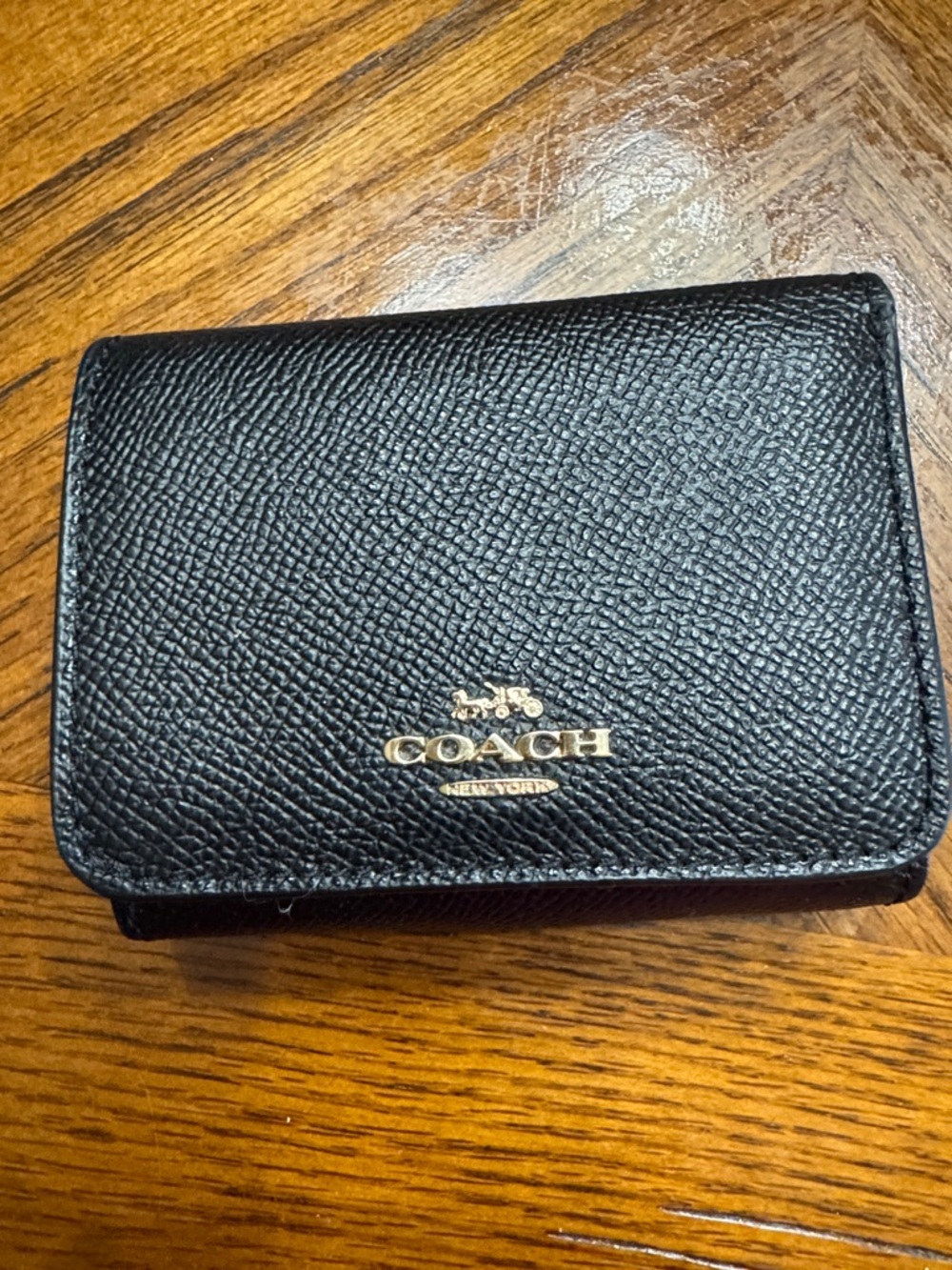 Coach Black Pebbled Leather Compact Trifold Wallet with Gold Logo